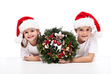 Kids with traditional advent wreath