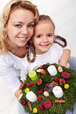 Woman and little girl with advent wreath