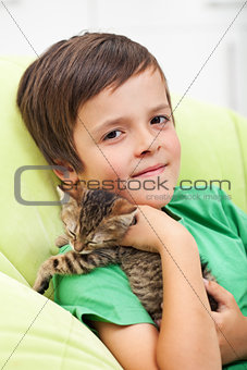Young boy with his kitten