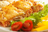 Baked fish with vegetables and herbs