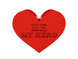 Big red heart. Phrase BE MY HERO cutout inside.