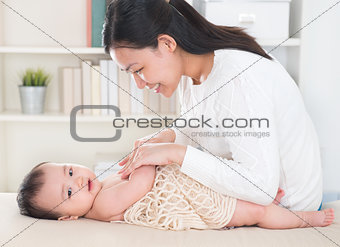 Mother massage baby