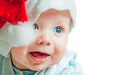 Portrait of a baby in a Christmas hat Sata Claus