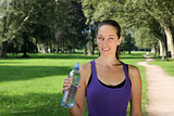 Athletic young woman with a water bottle