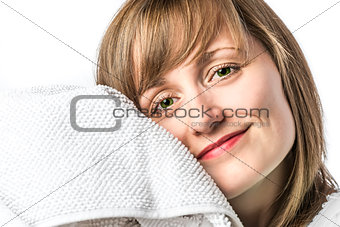 Young girl snuggled in towel