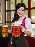 Beautiful Oktoberfest waitress with beer