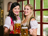 Beautiful Oktoberfest waitresses with beer