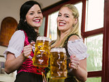 Gorgeous Oktoberfest waitresses with beer