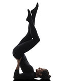 woman exercising gymnastic salamba sarvangasana Shoulder Stand y