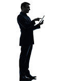 business man touchscreen digital tablet  silhouette
