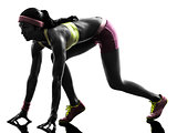 woman runner running on starting blocks silhouette