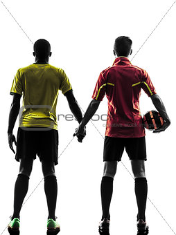 two men soccer player  standing hand in hand silhouette