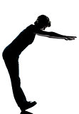 one young teenager boy or girl standing balancing on heels silho