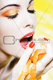 Woman Portrait Eat An orange tangerine fruit