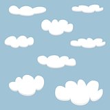 White vector clouds on light blue sky background set.