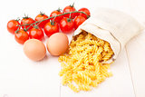 Pasta, eggs and tomato