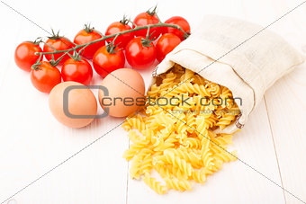 Pasta, eggs and tomato