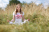 Young girl meditating in the field