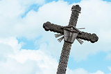 Wooden cross against blue sky 