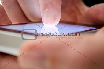 Man using touch screen device