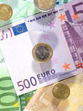 Money background from euro banknotes and coins