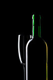 wine still life over black background