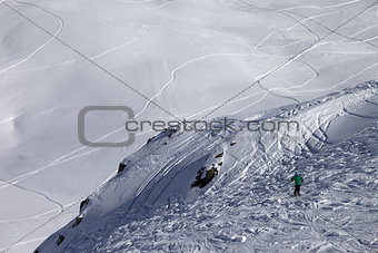 Skier on off-piste slope