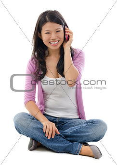 Asian woman talking on smart phone