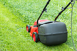 new lawnmower on green grass