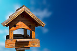 Little Old Birdhouse on Blue Sky