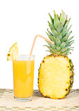 Pineapple and glass of juice