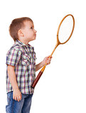 Boy with badminton racket on white