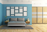 Blue modern bedroom with double bed and wardrobe