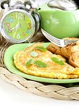 fresh egg omelet with basil for breakfast