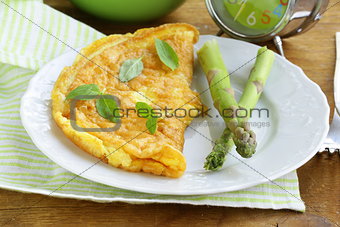fresh egg omelet with asparagus and basil