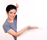 Now Presenting Female Sales Representative Holds Hand over Blank White Board
