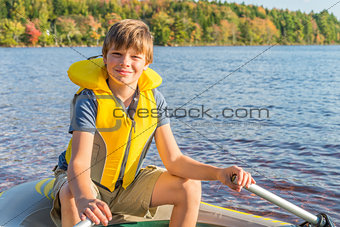 Boy in a boat in water