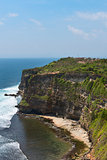 Cliffs above blue tropical sea