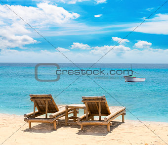 Tropical seascape with bamboo beach beds
