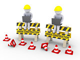 Under construction signs and two workers with laptops