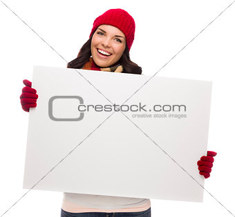 Excited Girl Wearing Winter Hat and Gloves Holds Blank Sign 