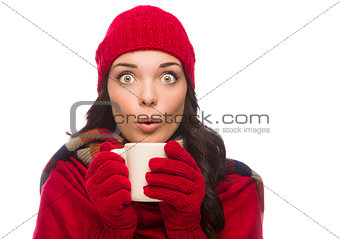 Wide Eyed Mixed Race Woman Wearing Winter Gloves Holds Mug 