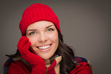Smilng Mixed Race Woman Wearing Winter Hat and Gloves 