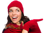 Mixed Race Woman Wearing Mittens and Pointing to the Side