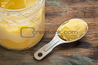 ghee in jar and spoon