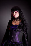 Portrait of beautiful gothic girl wearing Halloween costume  