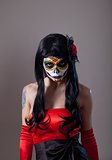 Sugar skull girl with red rose 