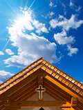 Roof of Wooden Church with Cross
