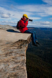 Tourist or photographer taking phots mountain landscape