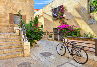 Street and stonrd houses at jewish quarter in Jerusalem.